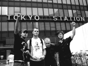 Great, you guys are in Tokyo! Now please stay there. Also, consider singing in Japanese, so I'll no longer comprehend your lame lyrics. Arigatou.
